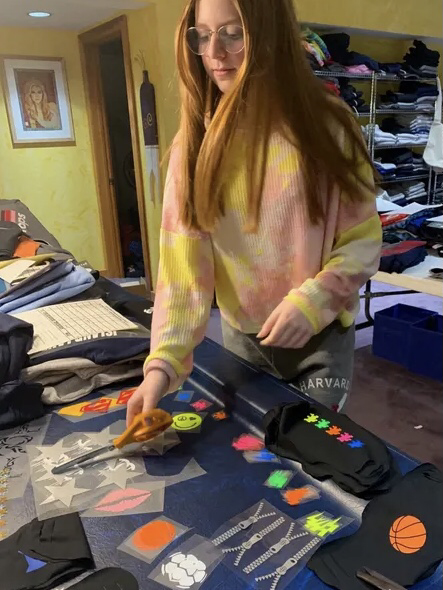 Annie Nathan prepares to make masks.