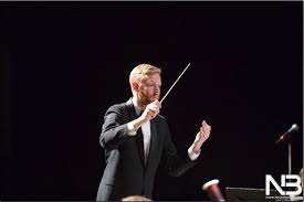 Mr. Obringer conducting an ensemble