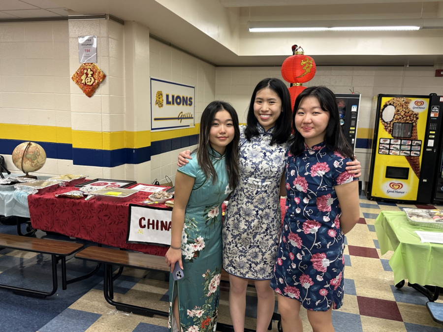 Students displayed cultural pride through traditional dress, cuisine, and music.